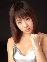 Mari Kobayashi petite Asian girl in a silver minidress